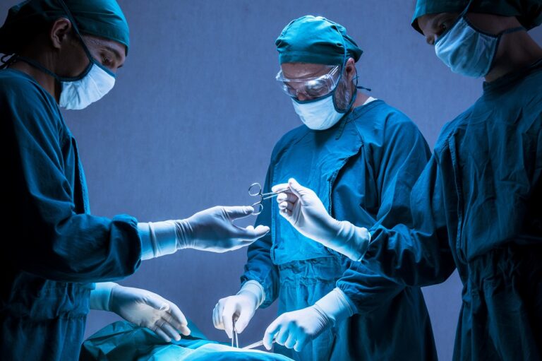 concentrated professional surgical doctor team operating surgery